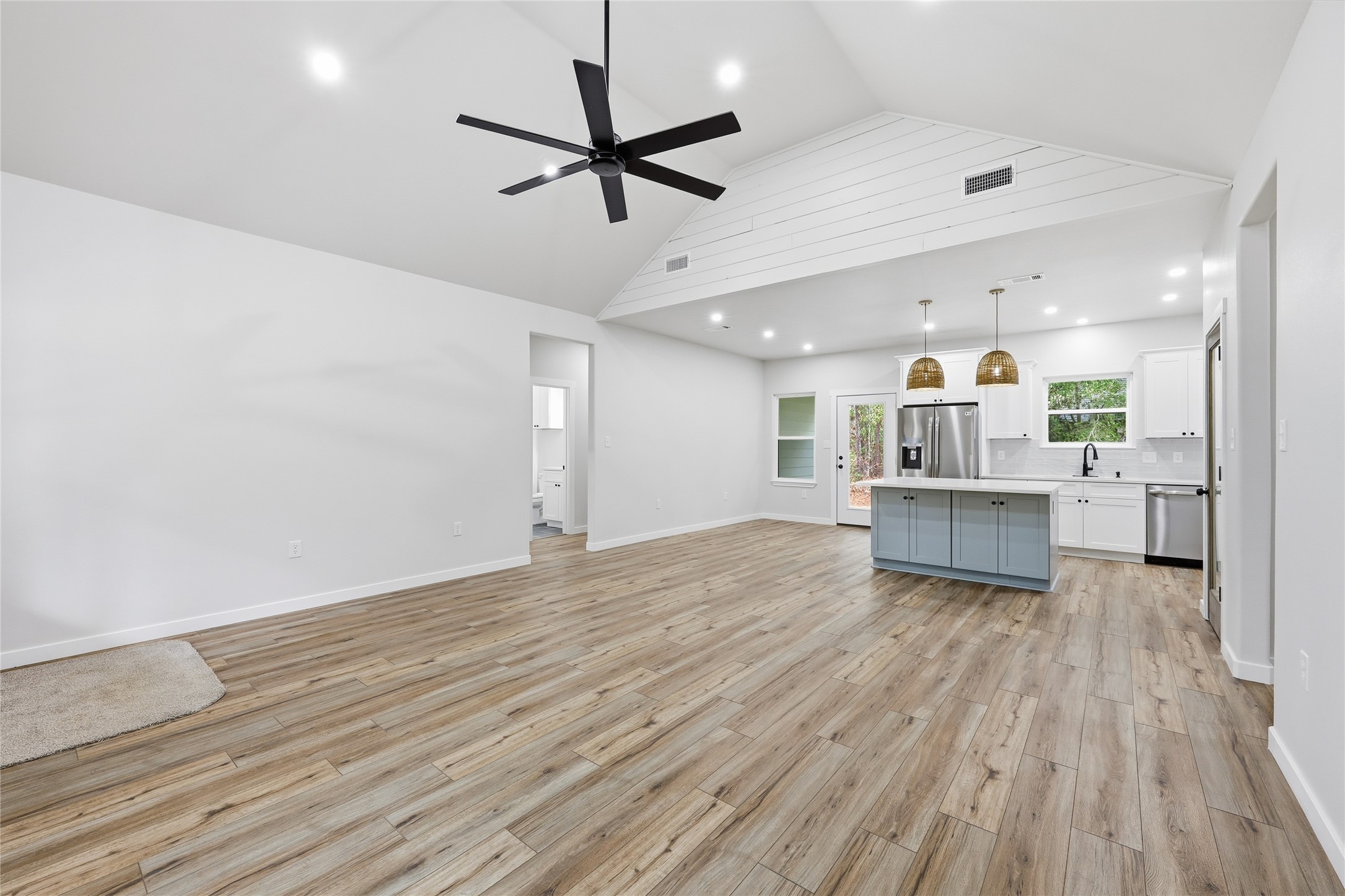 235 Dogwood Road Brookeland, TX 75931 - Photo 6 of 35 a view of a kitchen with a dishwasher and wooden floor