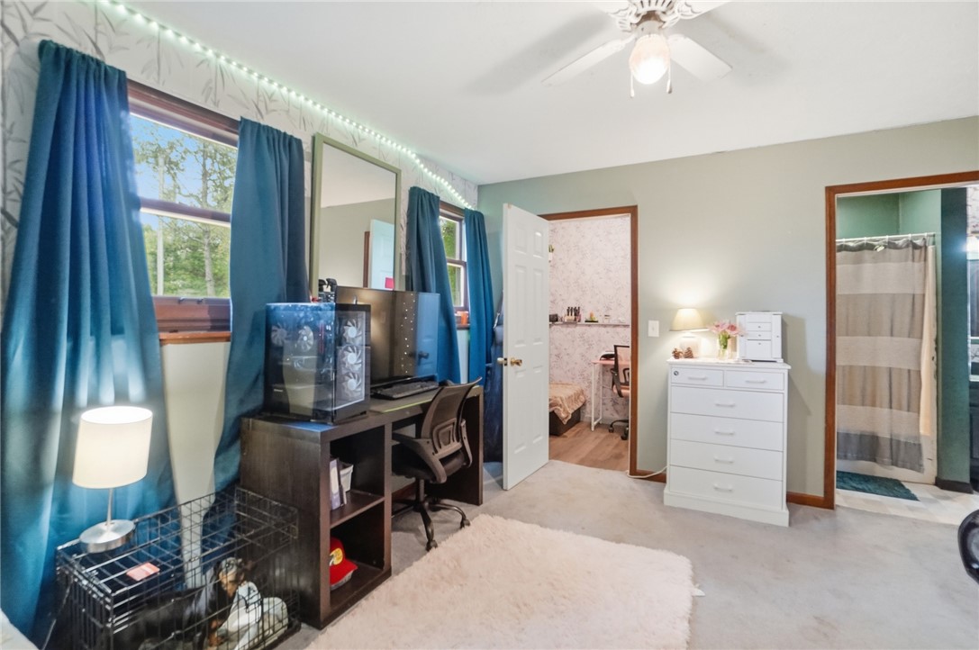 5209 North Addison New Carlisle Road St. Paris, OH 43072 - Photo 32 of 47 This bright and inviting room offers a comfortable and versatile living space for relaxation or work.