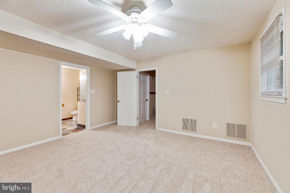 9944 Murnane Street Vienna, VA 22181 - Photo 31 of 42 Lower level rec. room makes a great guest room too