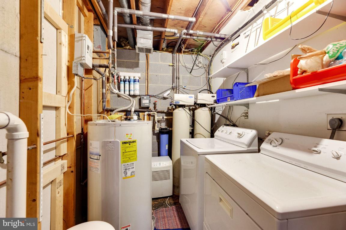 9944 Murnane Street Vienna, VA 22181 - Photo 36 of 42 Laundry and water filtration area