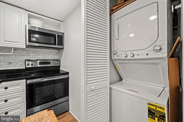 a kitchen with a stove and a microwave