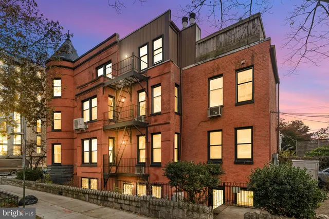 a front view of a multi story residential apartment building