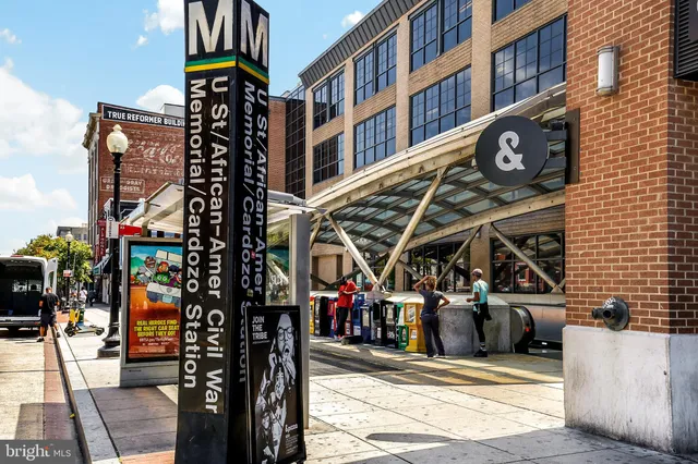 a view of a building with a street