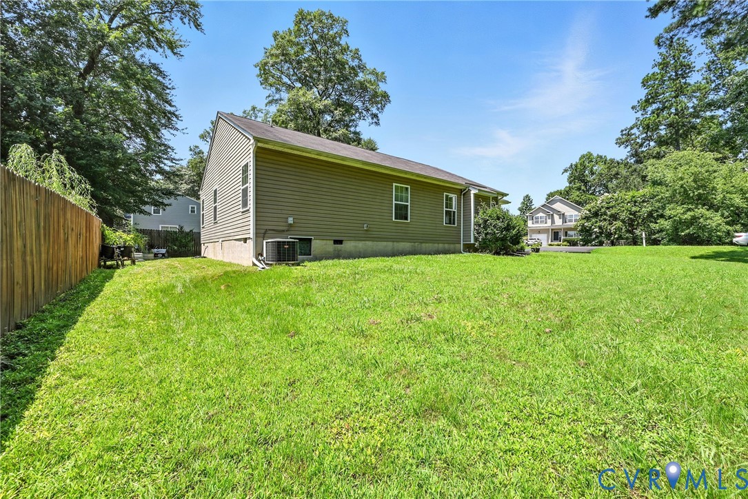 14006 Hackberry Road Chester, VA 23836 - Photo 27 of 41 a front view of house with yard and green space
