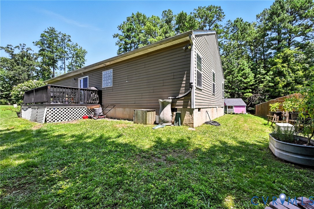 14006 Hackberry Road Chester, VA 23836 - Photo 30 of 41 a view of a house with a yard