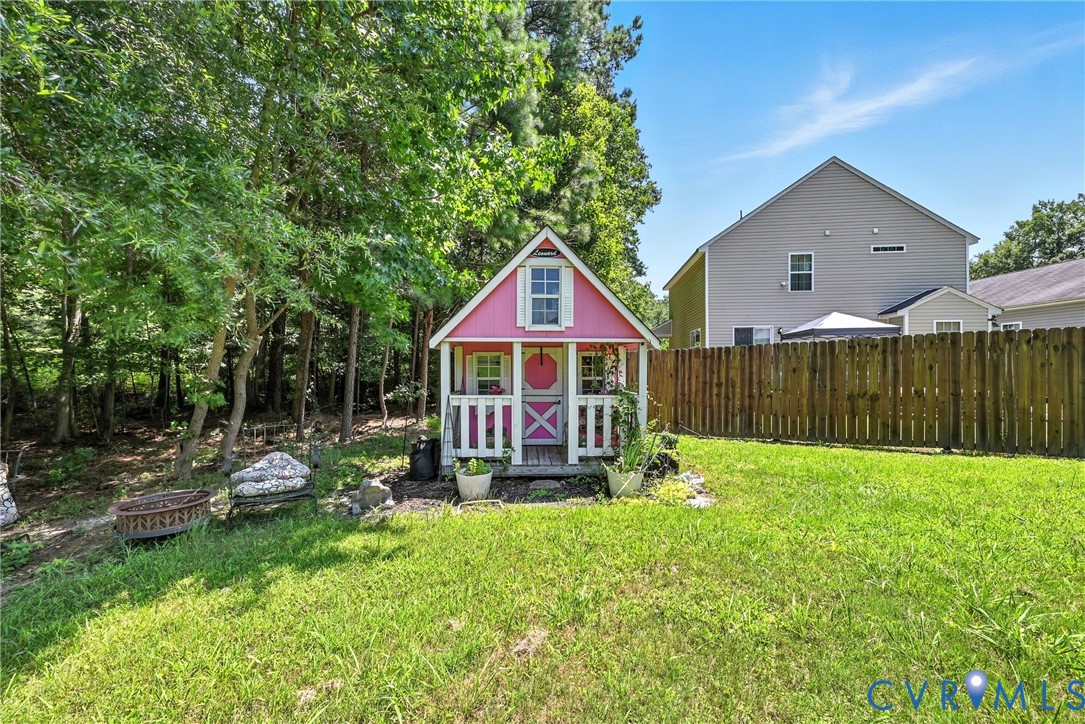 14006 Hackberry Road Chester, VA 23836 - Photo 32 of 41 a front view of a house with garden