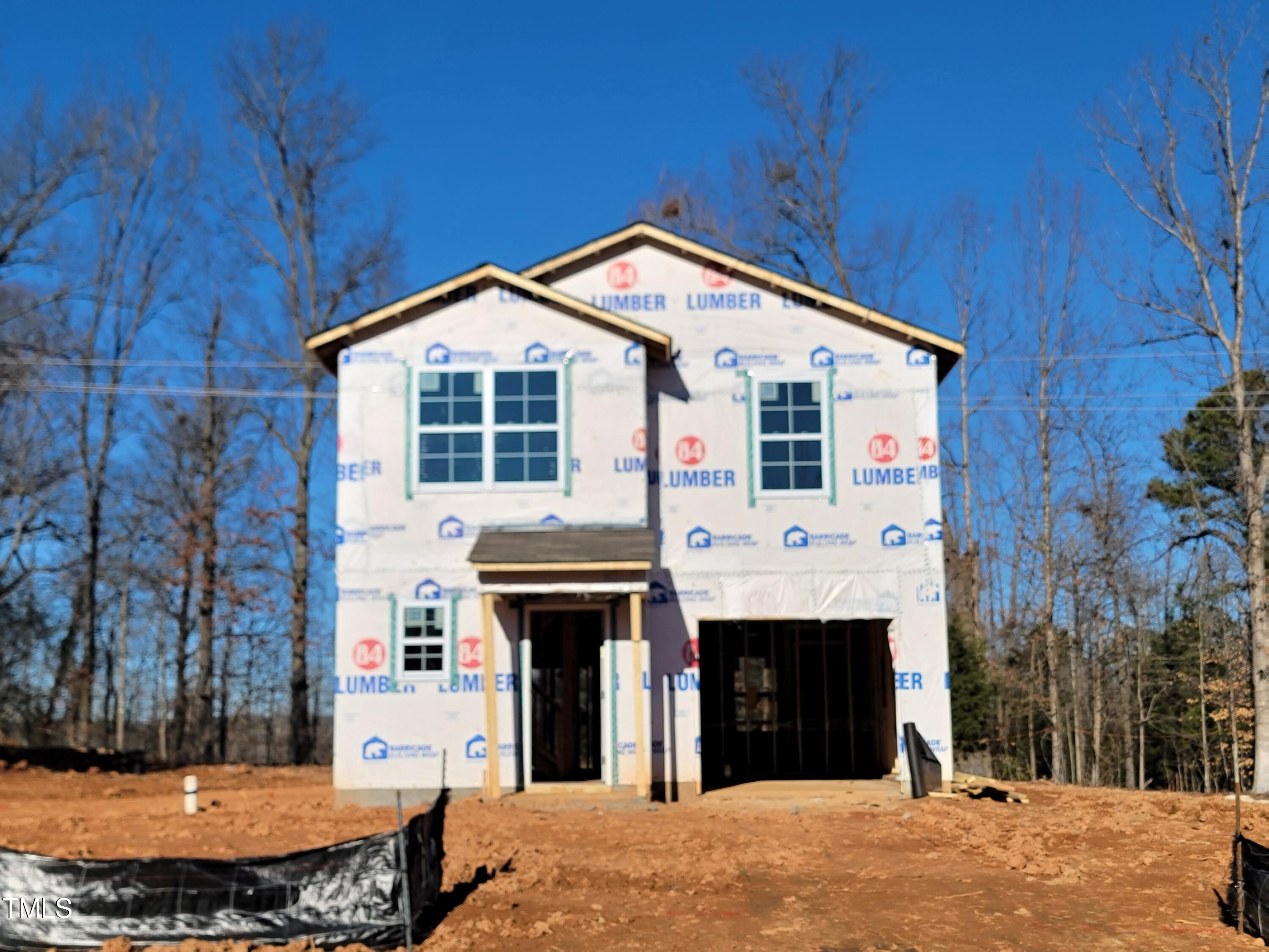 34 Maggie Lane Roxboro, NC 27573 - Photo 1 of 9 a front view of a house with a yard
