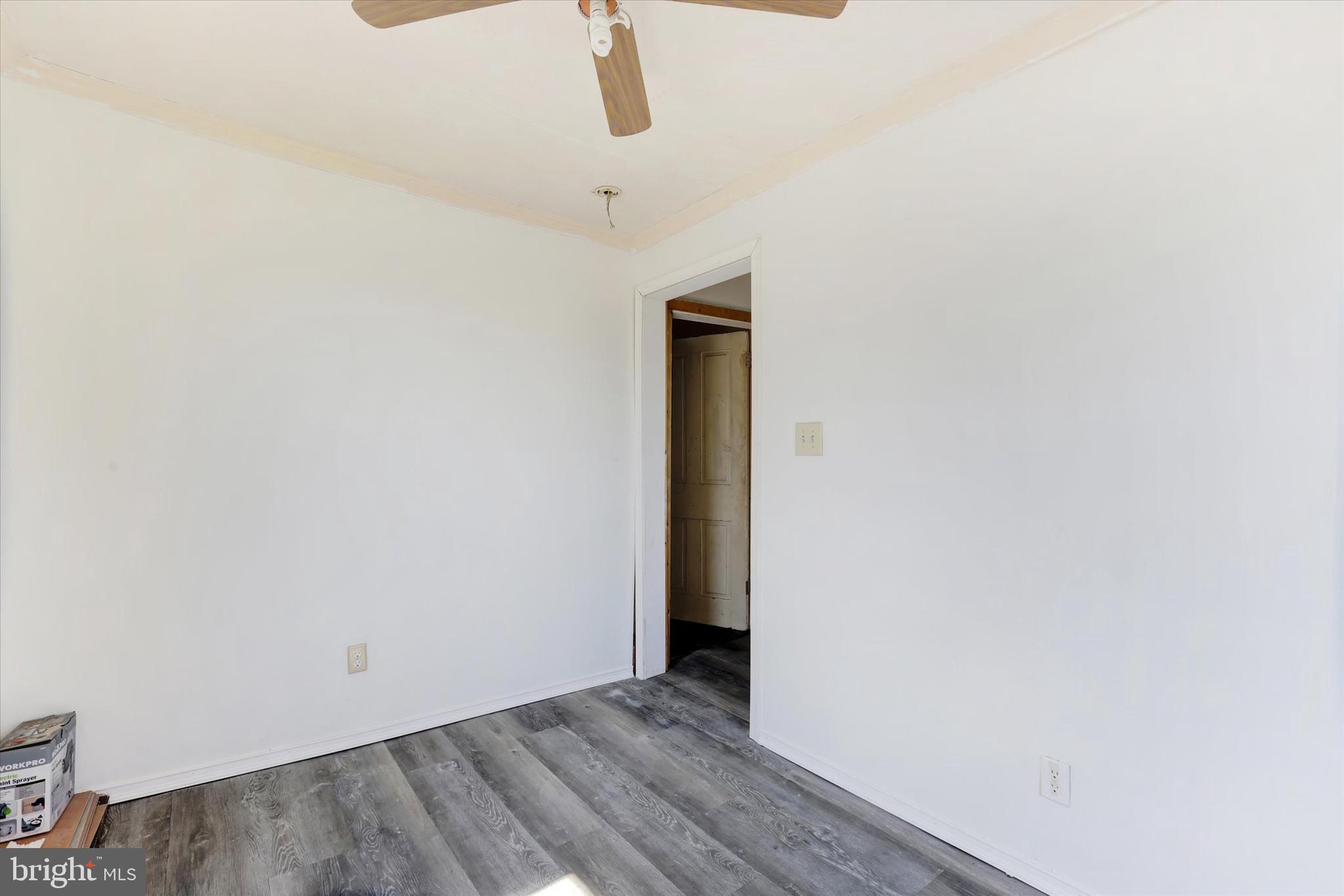 1435 Orchard Road Mifflinburg, PA 17844 - Photo 11 of 16 a view of an empty room with wooden floor