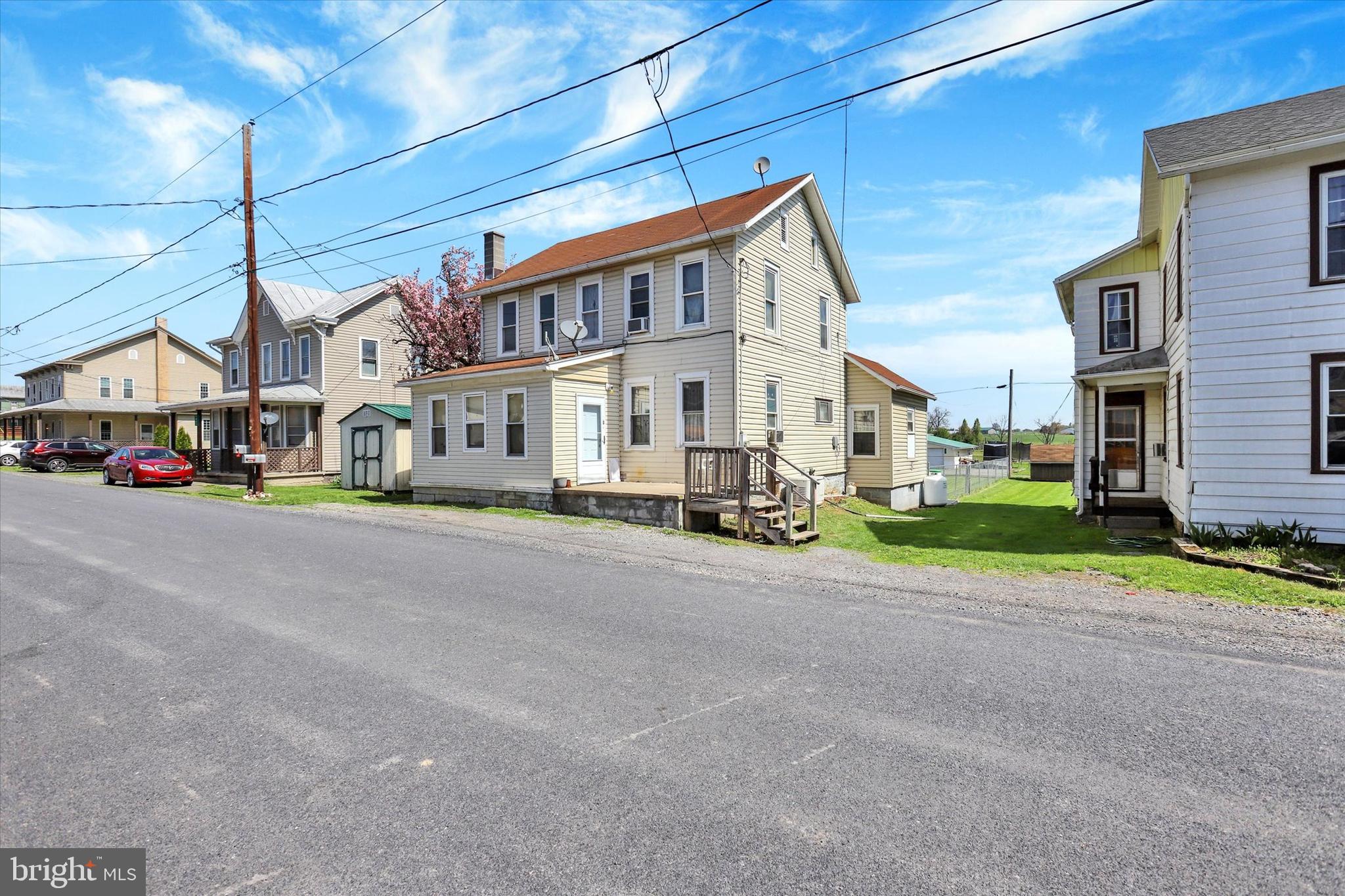 1435 Orchard Road Mifflinburg, PA 17844 - Photo 3 of 16 a view of a street with a building