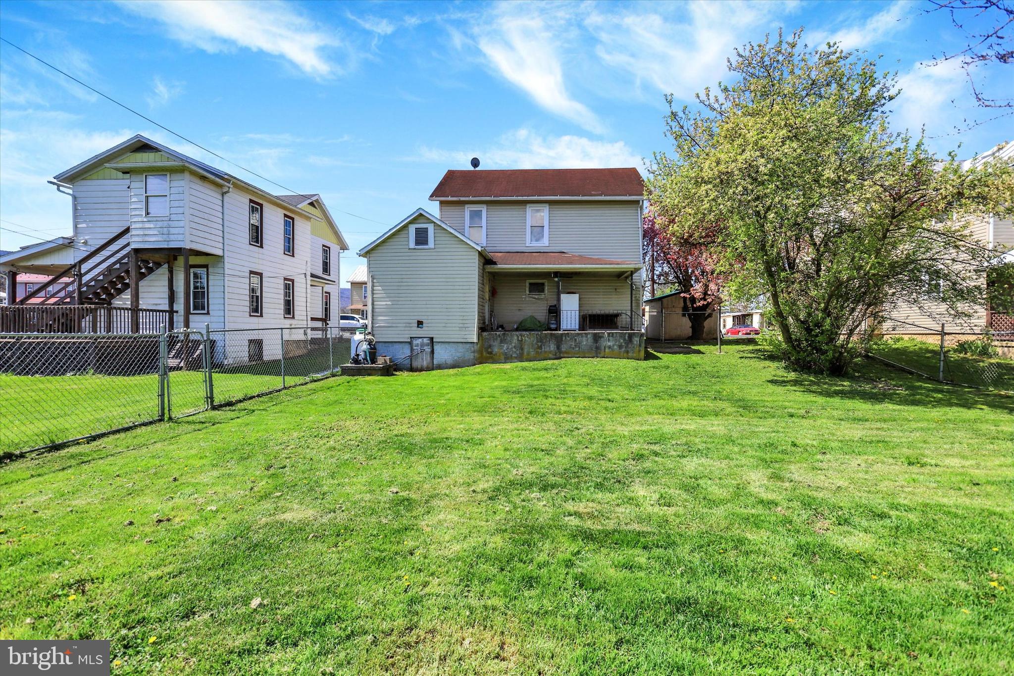 1435 Orchard Road Mifflinburg, PA 17844 - Photo 4 of 16 a front view of a house with a yard