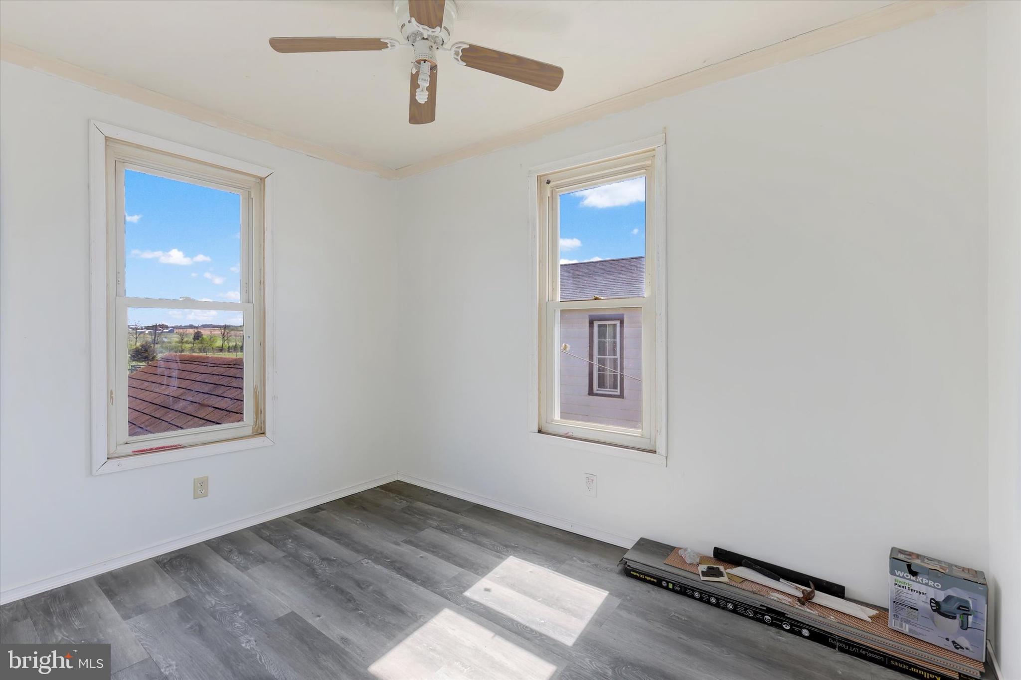 1435 Orchard Road Mifflinburg, PA 17844 - Photo 10 of 16 wooden floor in an empty room with a window