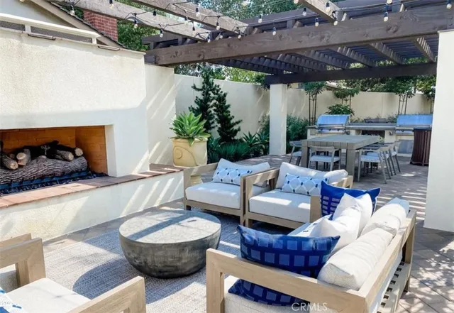 a outdoor living space with furniture and garden view