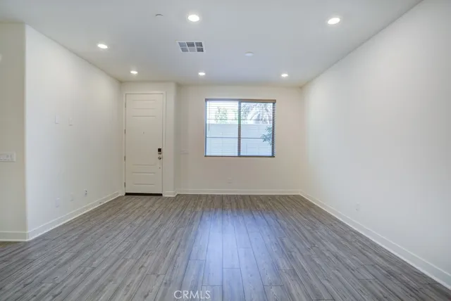 a view of kitchen with wooden floor