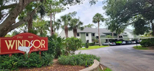 a view of a street with cars park