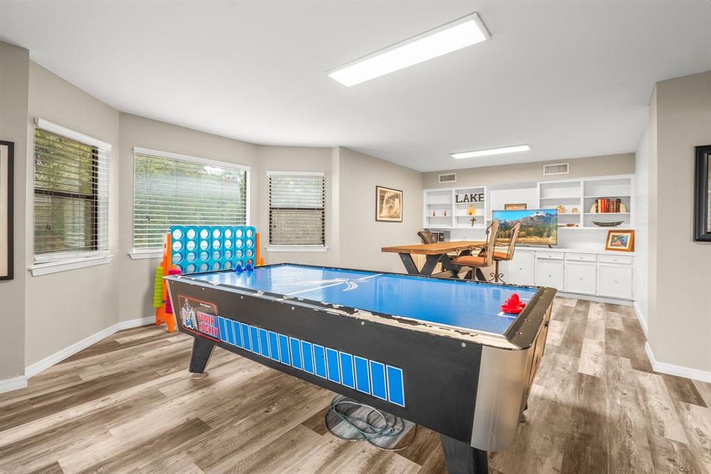 664 Lake Point Loop Pottsboro, TX 75076 - Photo 27 of 40 a bedroom with furniture and a window