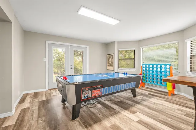 a living room filled with furniture and a table