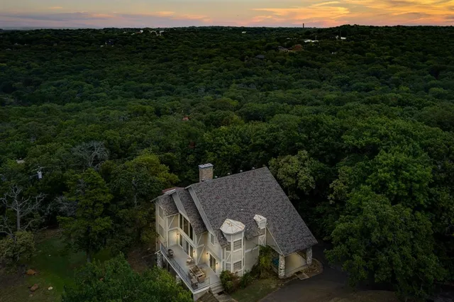 a view of a table and chairs in the outdoor