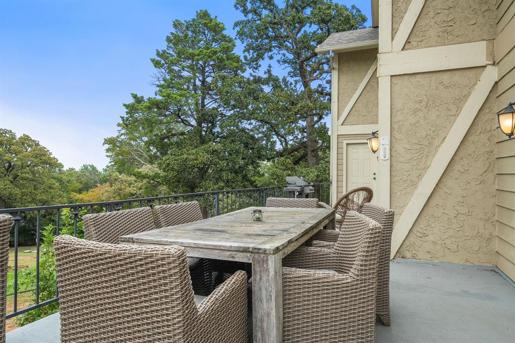 664 Lake Point Loop Pottsboro, TX 75076 - Photo 33 of 40 a view of a balcony with table and chairs