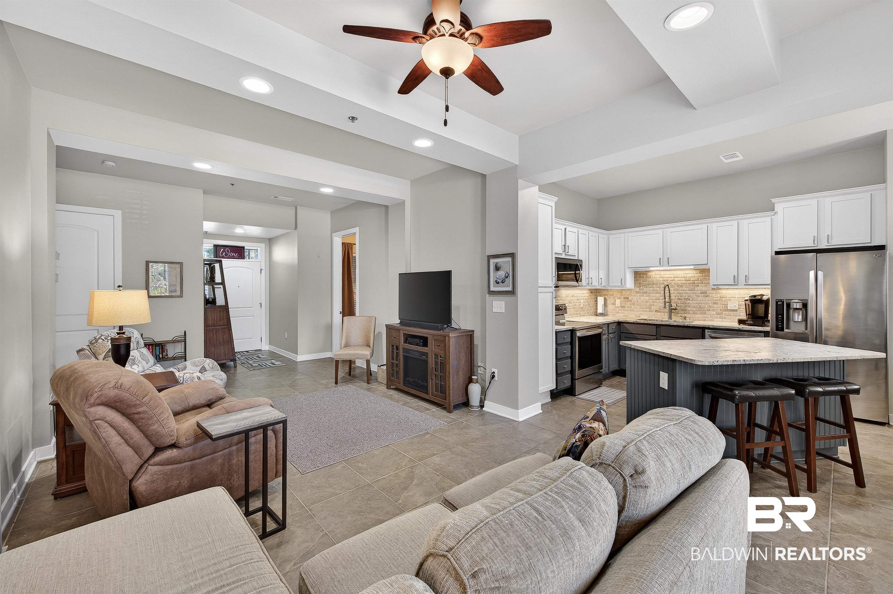 1430 West Regency Road, Unit I102 Gulf Shores, AL 36542 - Photo 7 of 31 Living area featuring a ceiling fan, recessed lighting, and light tile patterned floors