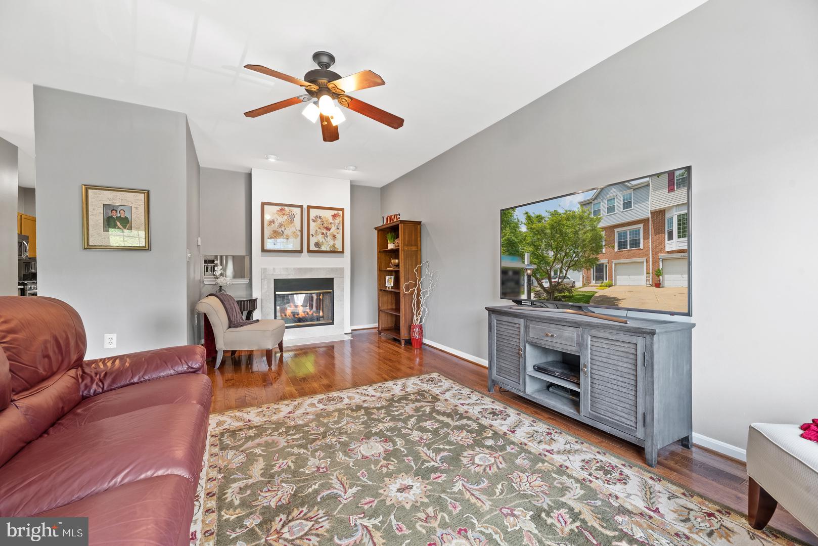 304 Rangers Way Southeast Leesburg, VA 20175 - Photo 9 of 26 Living Room with cozy fireplace