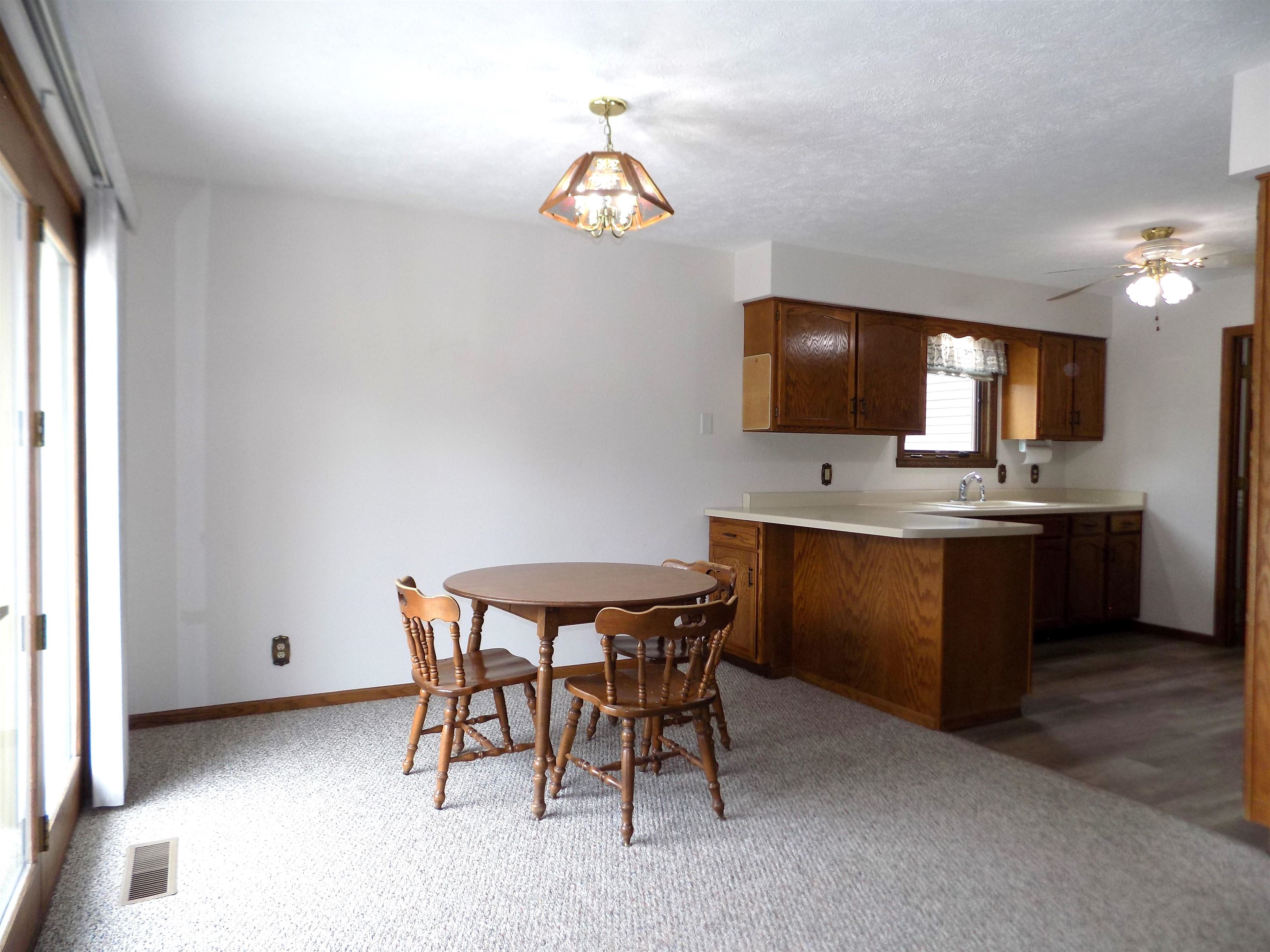 4252 Waltham Road Roscoe, IL 61073 - Photo 13 of 31 a view of kitchen with workspace and window