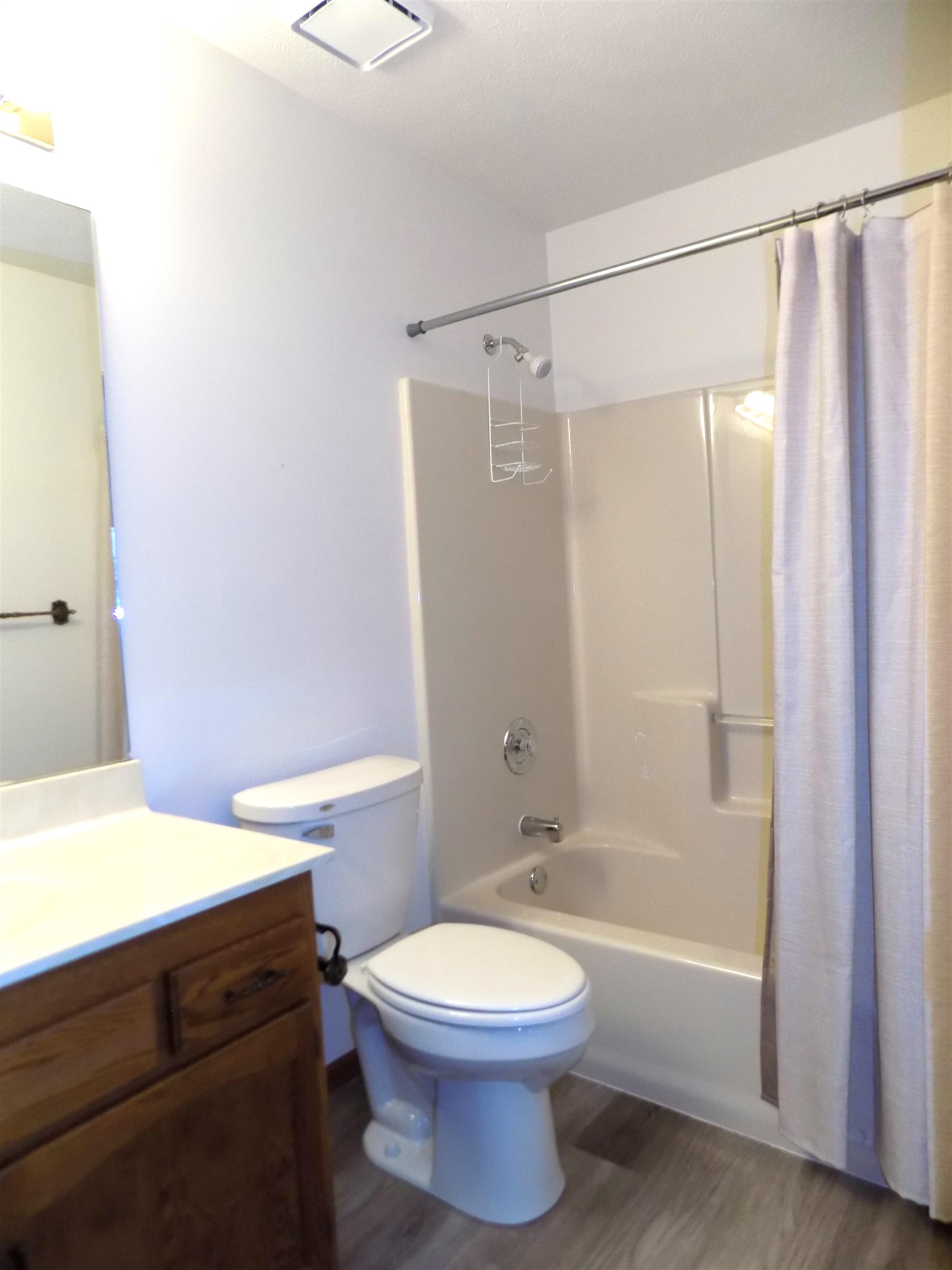 4252 Waltham Road Roscoe, IL 61073 - Photo 16 of 31 a bathroom with a toilet a sink and shower