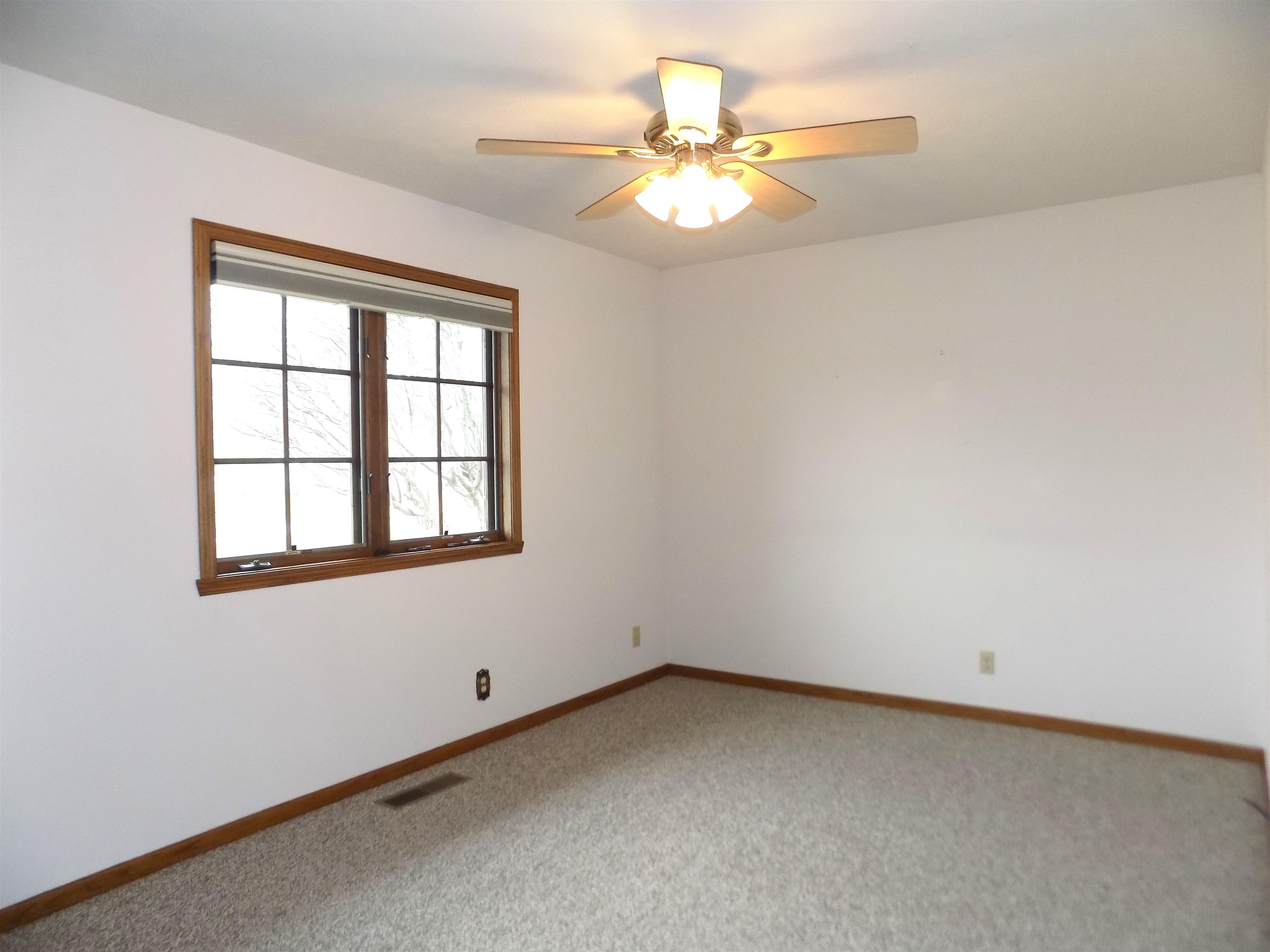 4252 Waltham Road Roscoe, IL 61073 - Photo 20 of 31 an empty room with a window