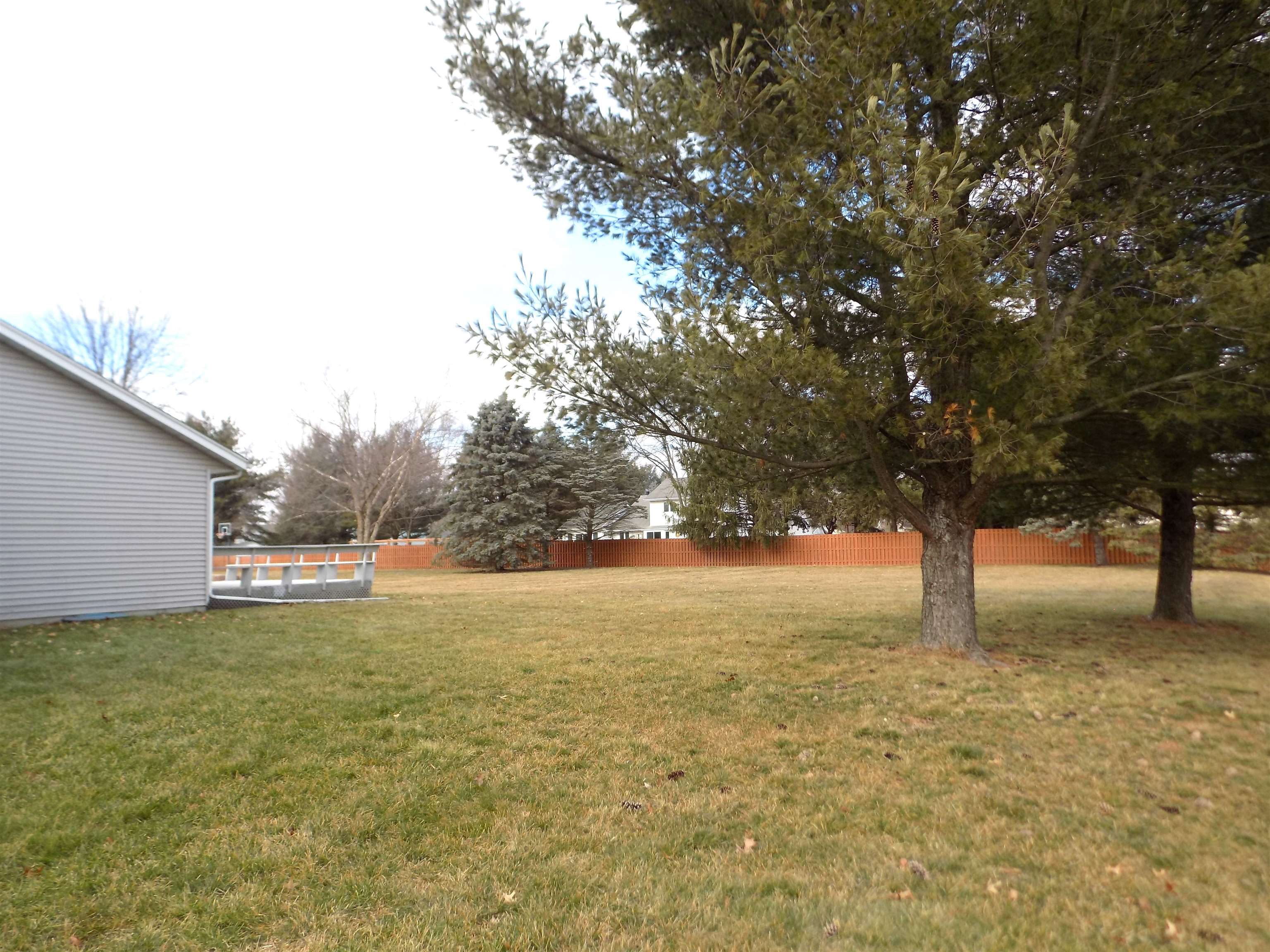 4252 Waltham Road Roscoe, IL 61073 - Photo 30 of 31 a view of a field with an tree