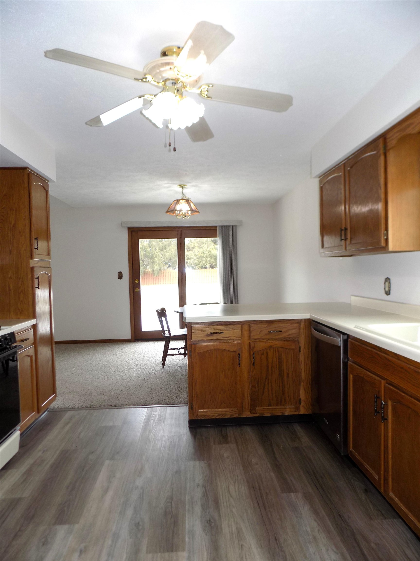 4252 Waltham Road Roscoe, IL 61073 - Photo 8 of 31 a kitchen with sink cabinets and window