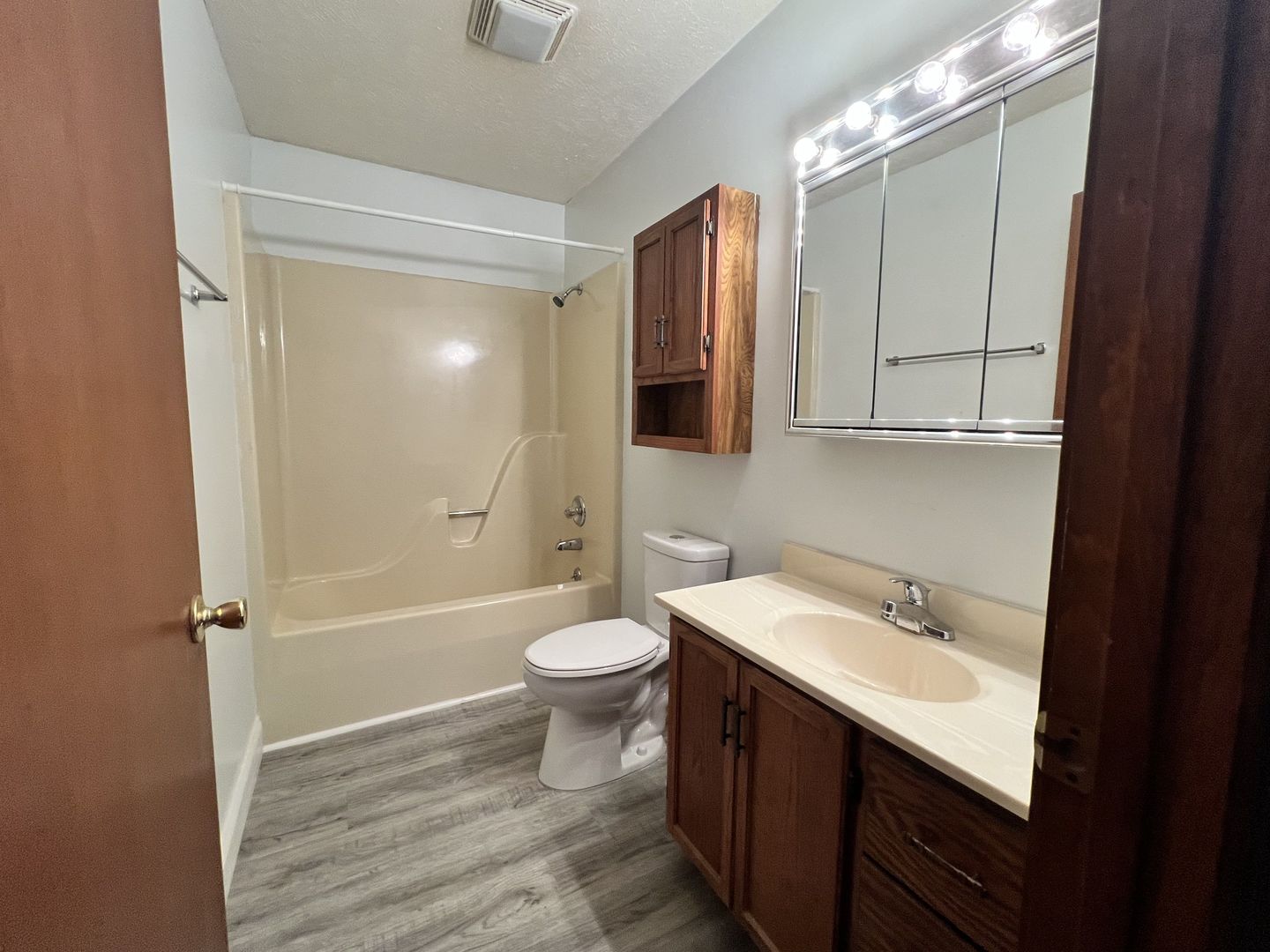 1525 Spruce Street Murphysboro, IL 62966 - Photo 11 of 13 a bathroom with a sink a toilet and shower