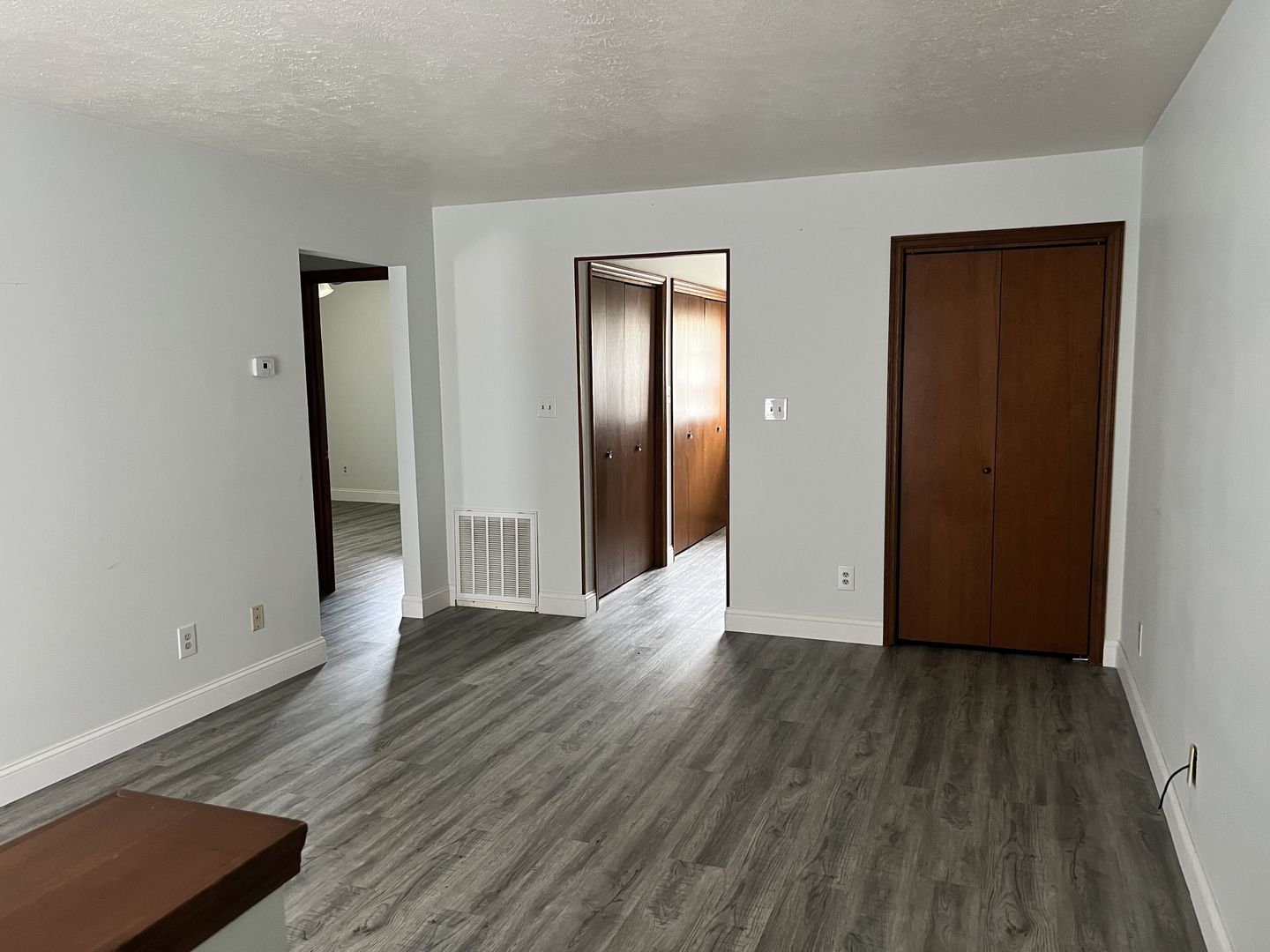 1525 Spruce Street Murphysboro, IL 62966 - Photo 8 of 13 an empty room with wooden floor and closet