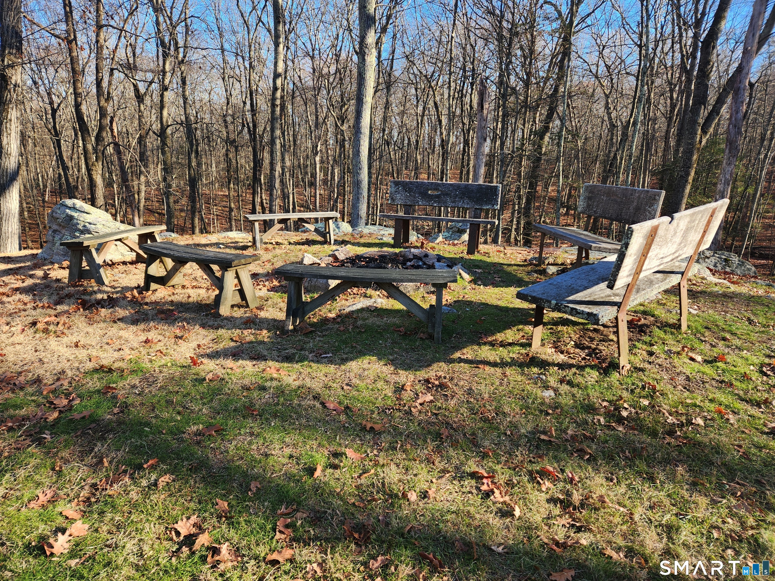 11 Judges Hollow Road Fairfield, CT 06824 - Photo 3 of 10 a view of a lake with outdoor seating