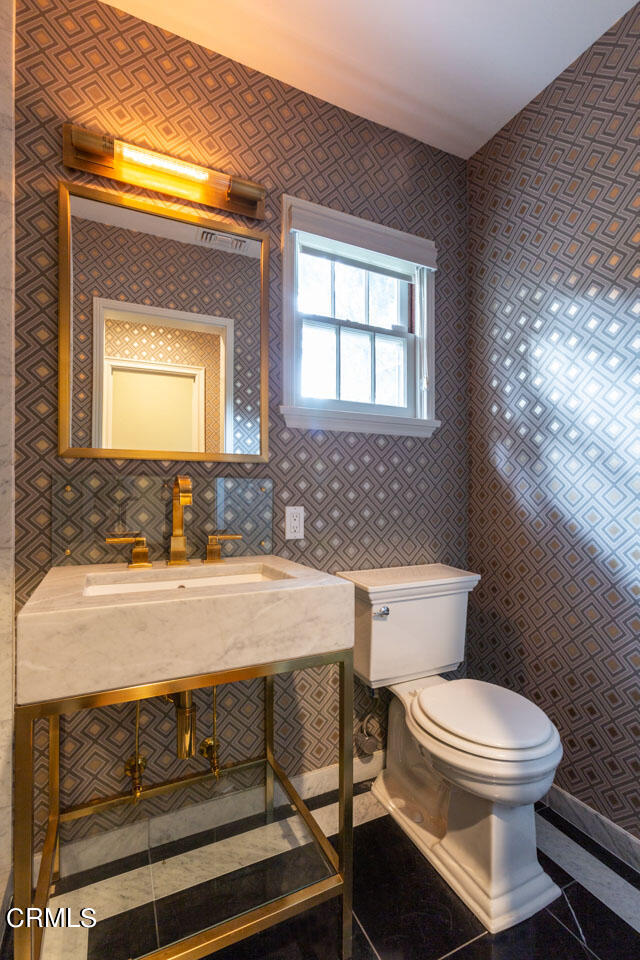 655 Elliott Drive Pasadena, CA 91106 - Photo 26 of 39 a bathroom with a sink and a toilet