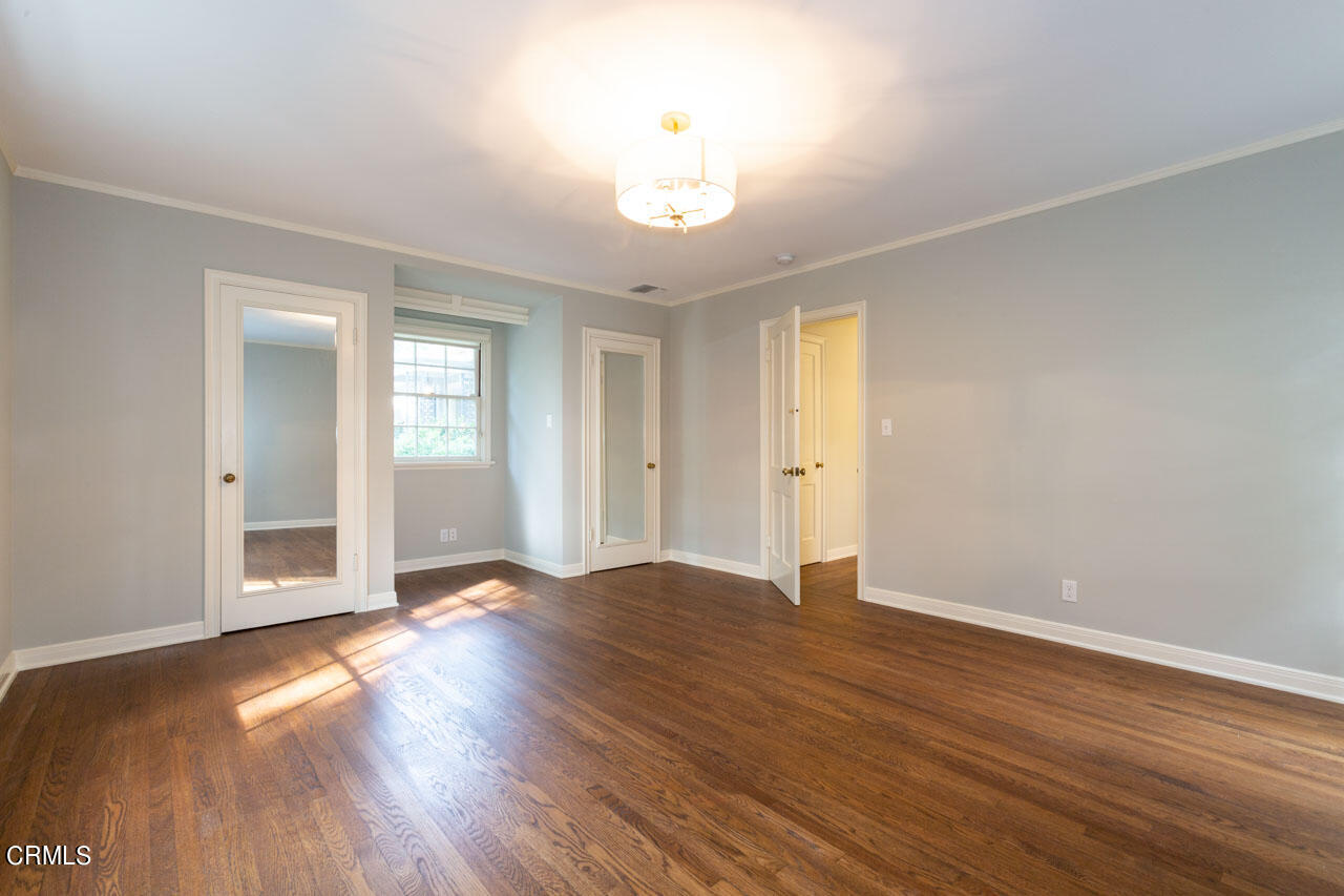 655 Elliott Drive Pasadena, CA 91106 - Photo 31 of 39 wooden floor in an empty room with a window
