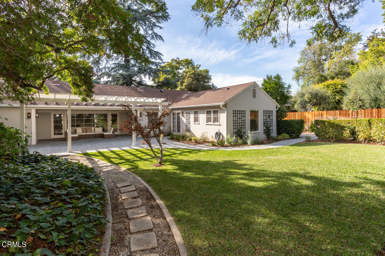 655 Elliott Drive Pasadena, CA 91106 - Photo 36 of 39 a view of a house with a big yard and potted plants