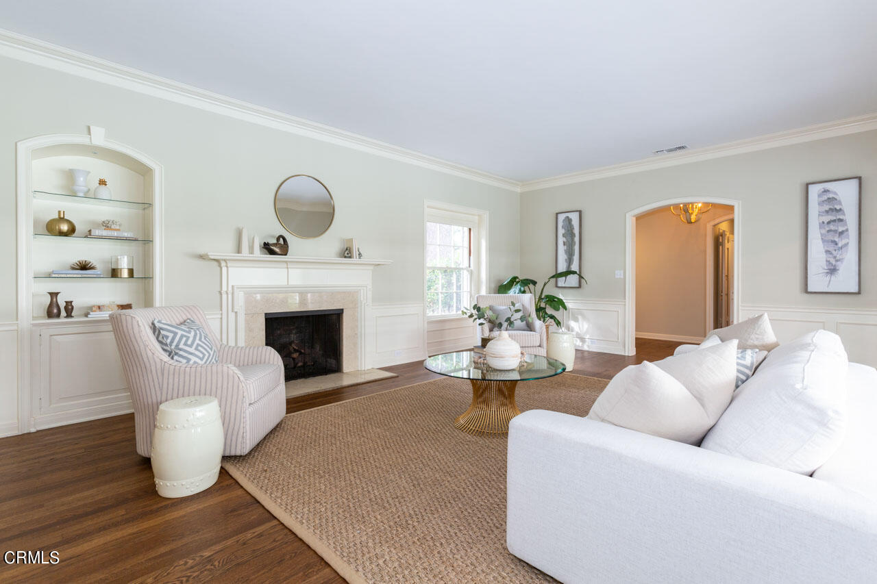 655 Elliott Drive Pasadena, CA 91106 - Photo 9 of 39 a living room with furniture and a fireplace