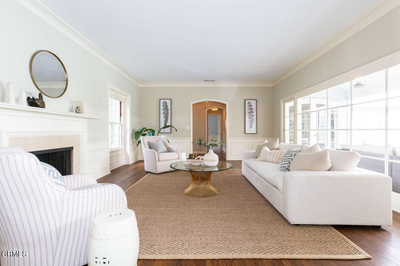 655 Elliott Drive Pasadena, CA 91106 - Photo 10 of 39 a living room with fireplace furniture and a large window