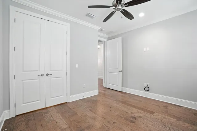 a view of an empty walk in closet