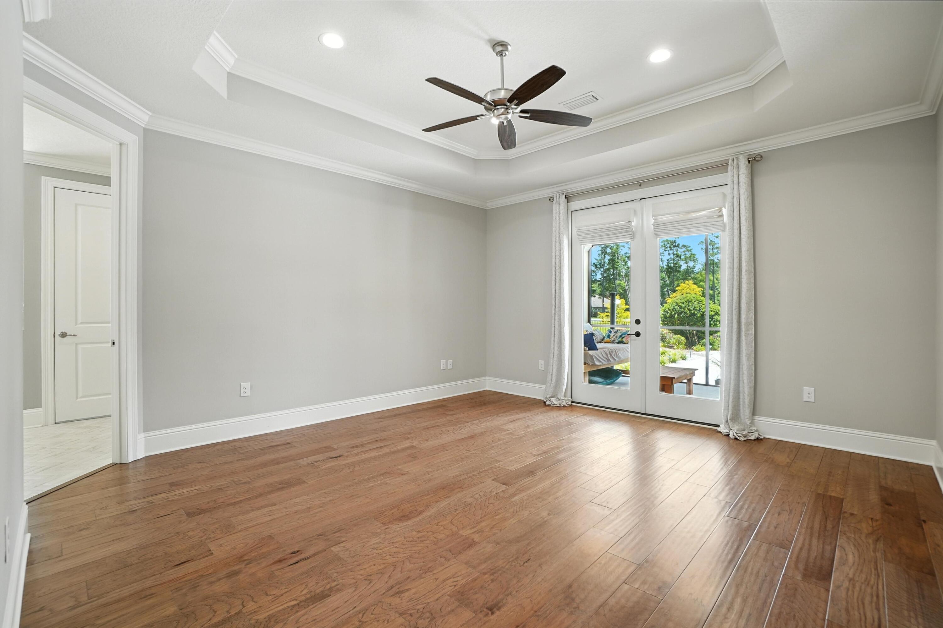 396 Revana Way Freeport, FL 32439 - Photo 27 of 68 a view of an empty room with wooden floor and a window
