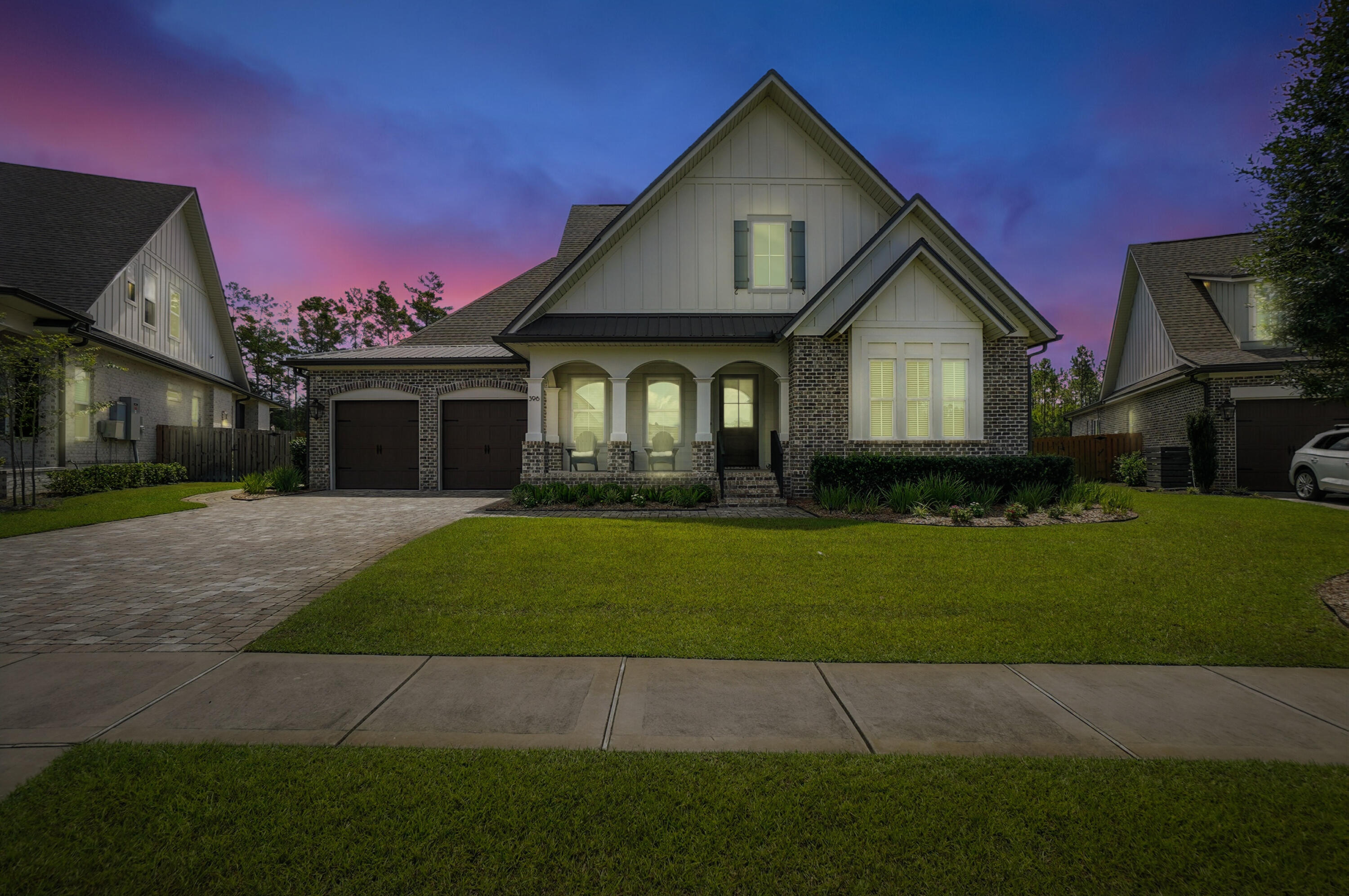 396 Revana Way Freeport, FL 32439 - Photo 3 of 68 a front view of a house with a garden