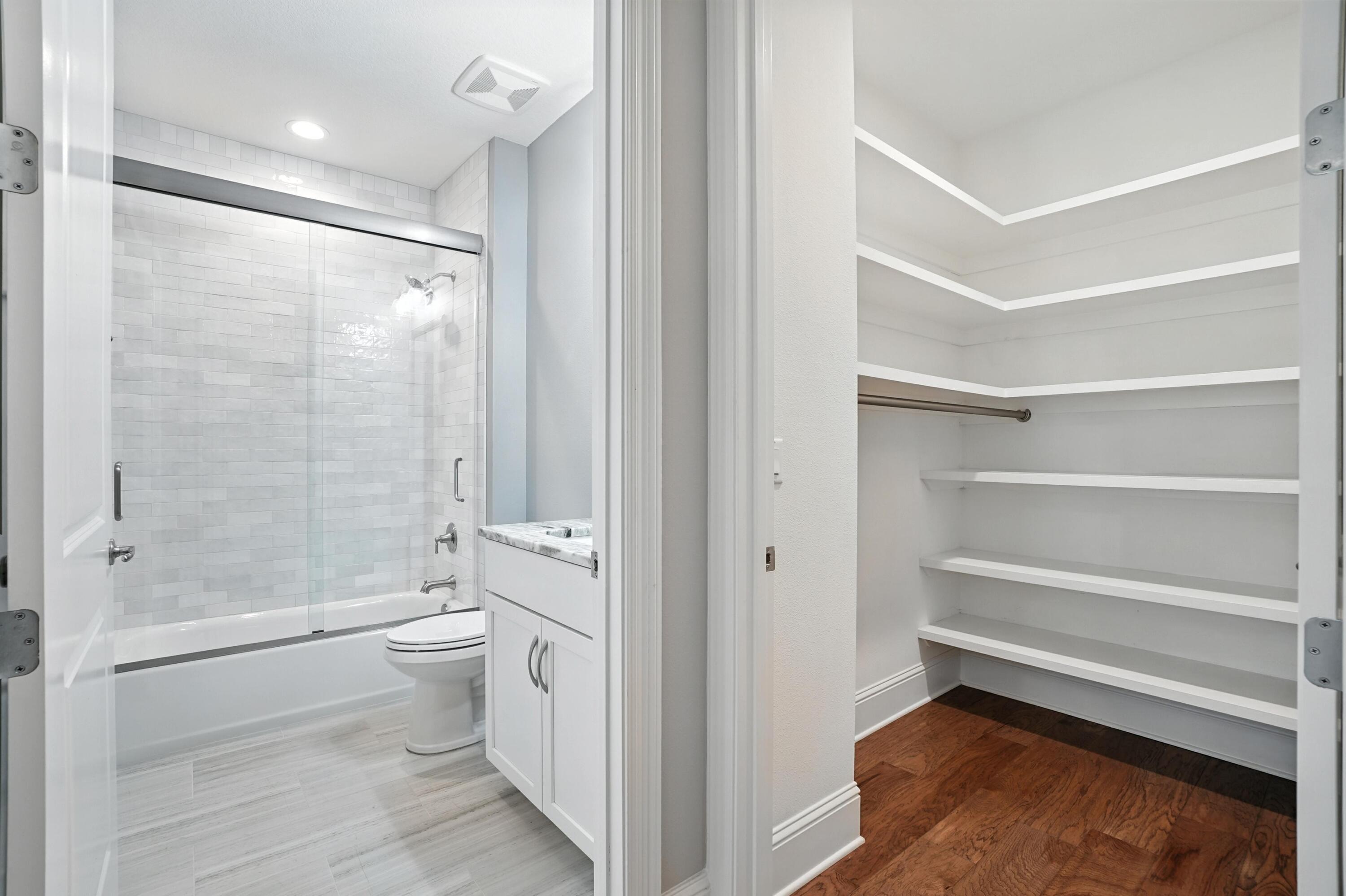 396 Revana Way Freeport, FL 32439 - Photo 34 of 68 a bathroom with a shower a toilet and a shower