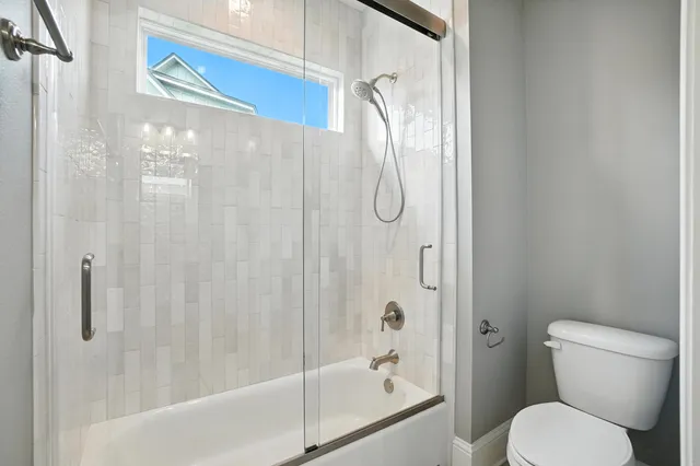 a outdoor space with patio couch and a potted plant