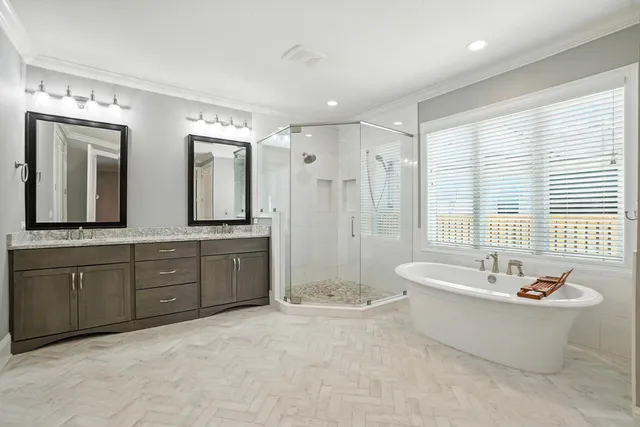 a open kitchen with stainless steel appliances granite countertop a barbecue grill and couches with wooden floor