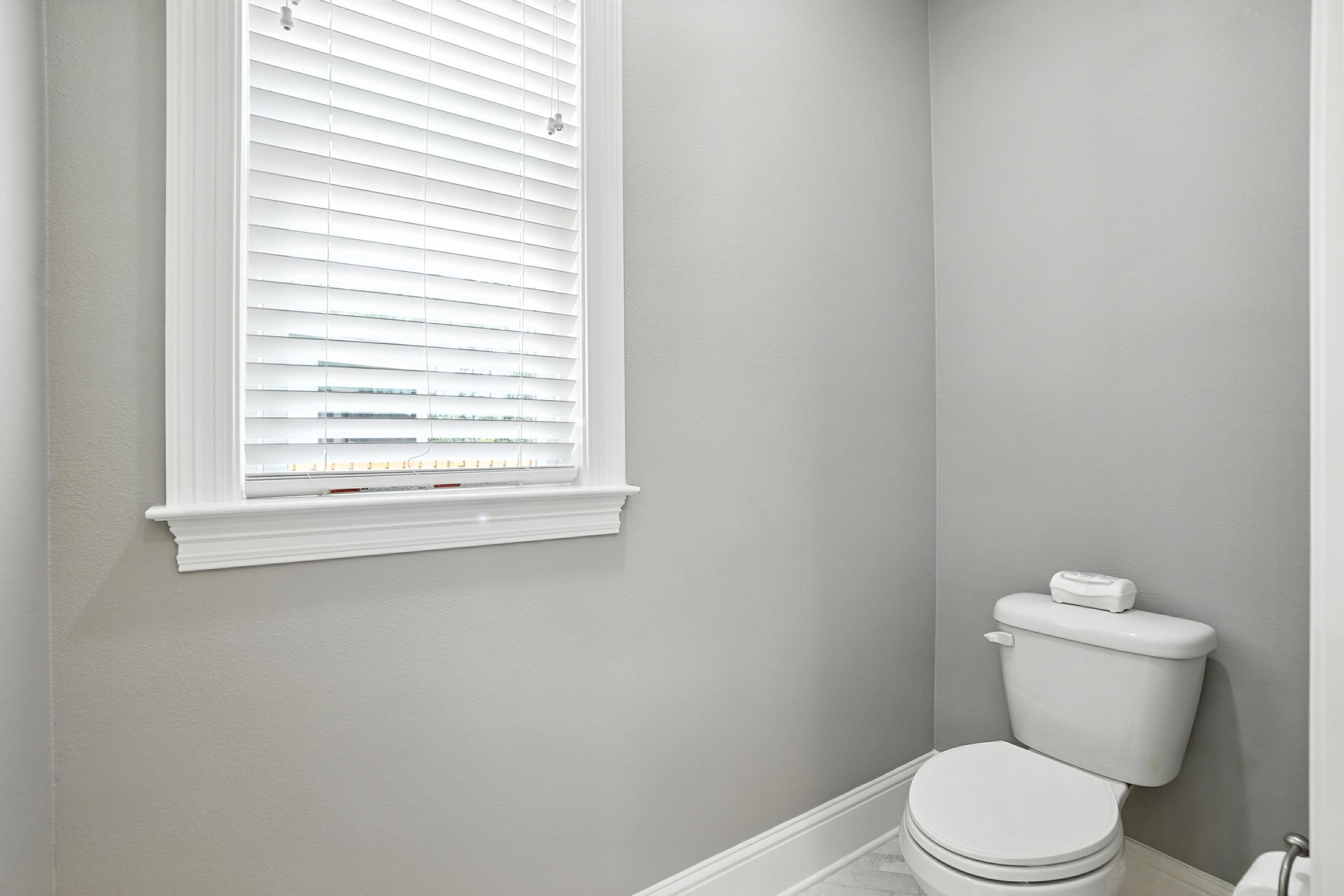 396 Revana Way Freeport, FL 32439 - Photo 40 of 68 a white toilet sitting next to a window