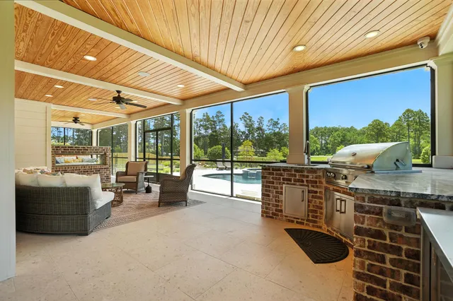 a view of a swimming pool and lounge chair