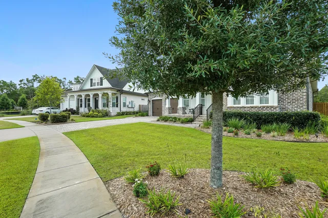 a view of a house with outdoor seating space