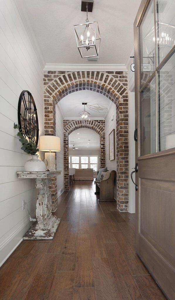 396 Revana Way Freeport, FL 32439 - Photo 9 of 68 a view of livingroom and dining room with chandelier