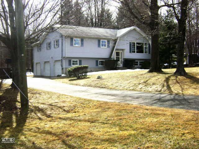 41 Gillotti Road New Fairfield, CT 06812 - Photo 1 of 1 a view of a house with snow on the road
