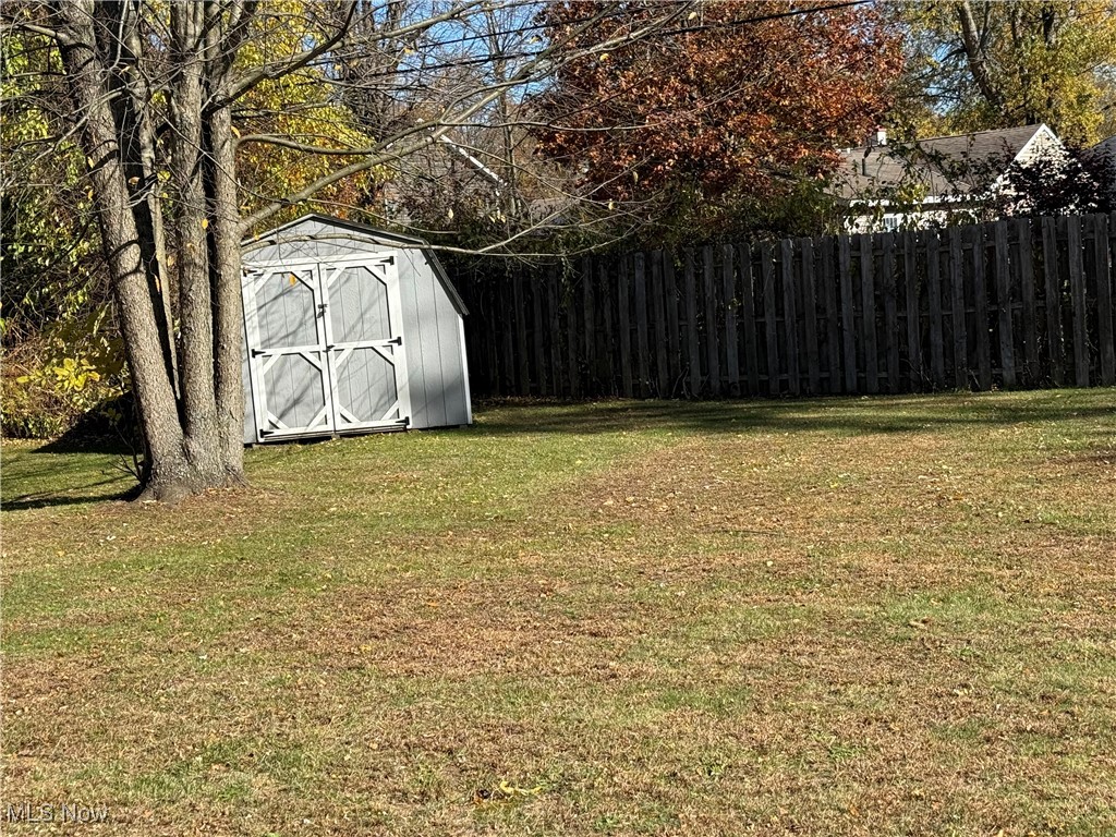 1877 Clyde Road Madison, OH 44057 - Photo 18 of 19 View of yard featuring a shed