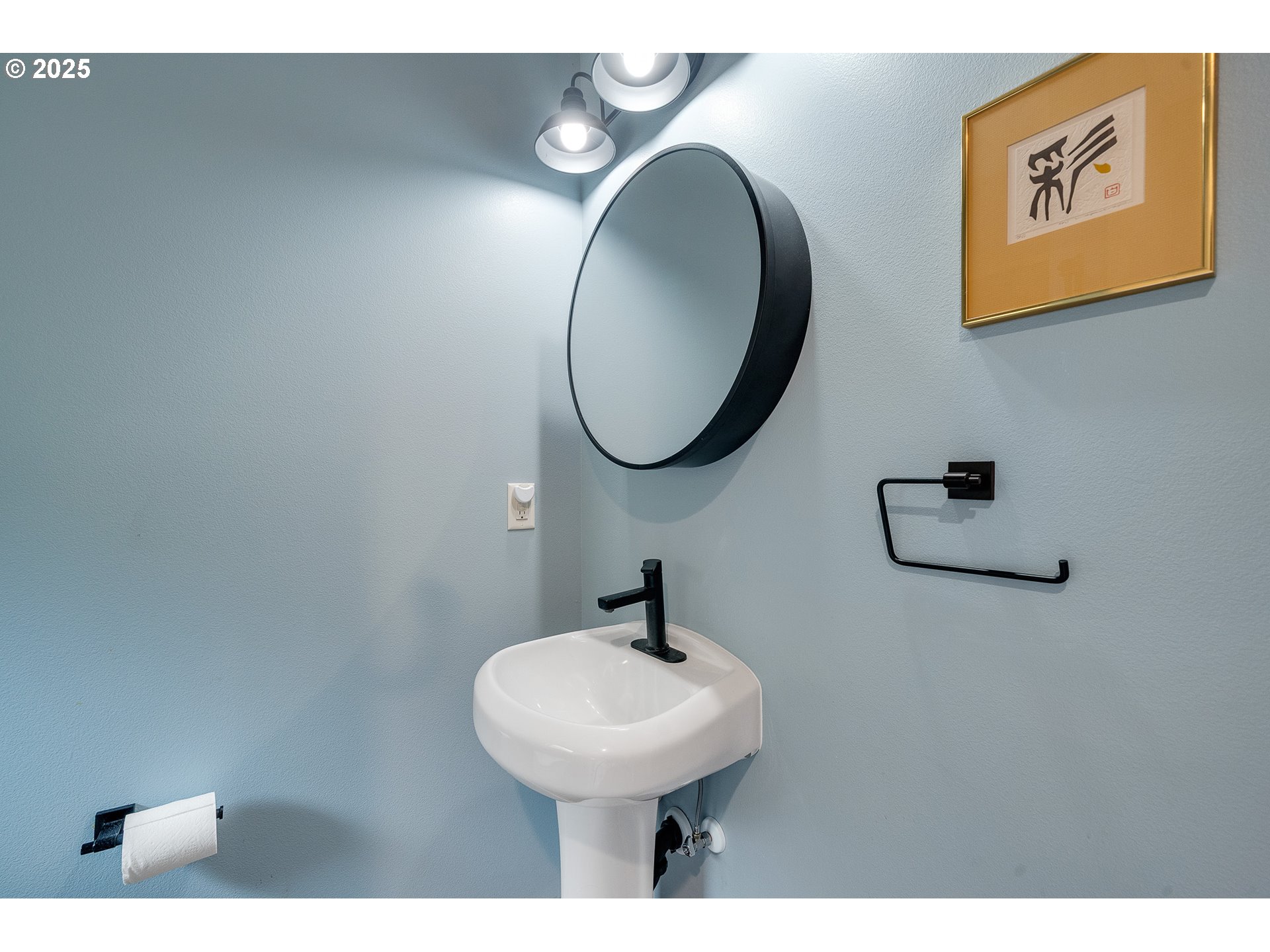 2375 Bayocean Road Northwest Tillamook, OR 97141 - Photo 15 of 37 a bathroom with a sink and a mirror